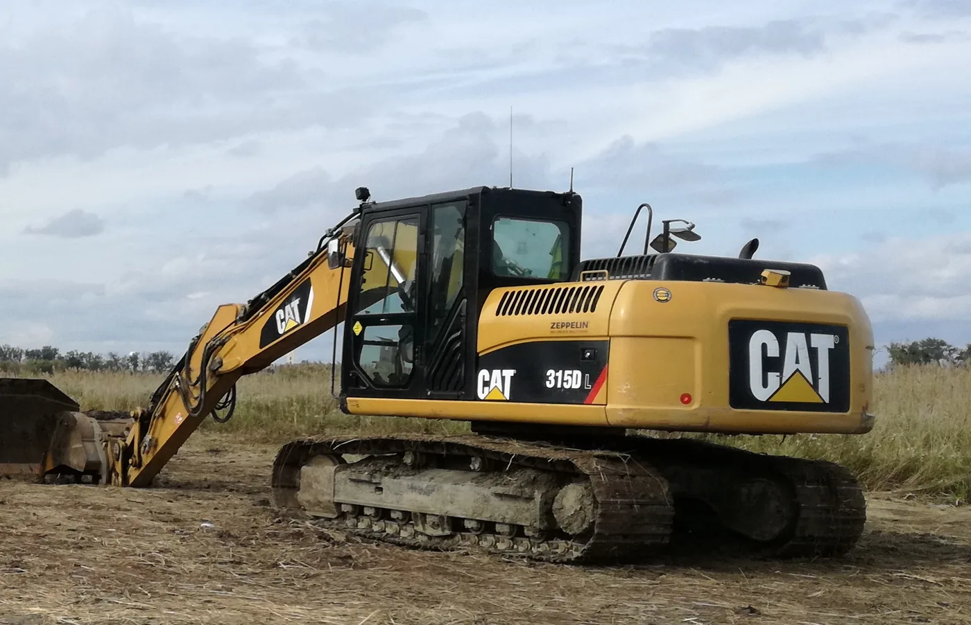 CAT 315D — vozový park HOLCNER – DOPRAVA